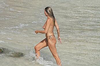 Heidi Klum topless at beach Getaway in St. Barts