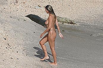 Heidi Klum topless at beach Getaway in St. Barts