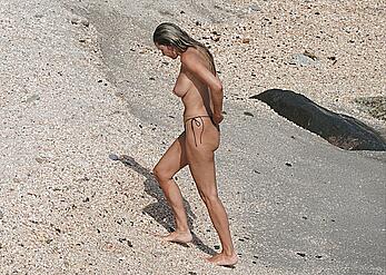 Heidi Klum topless at beach Getaway in St. Barts
