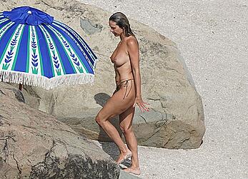 Heidi Klum topless at beach Getaway in St. Barts