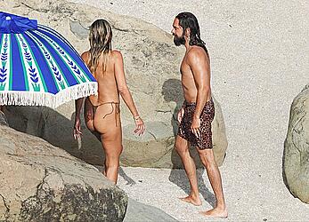 Heidi Klum topless at beach Getaway in St. Barts