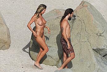 Heidi Klum topless at beach Getaway in St. Barts