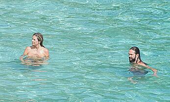 Heidi Klum topless at beach Getaway in St. Barts