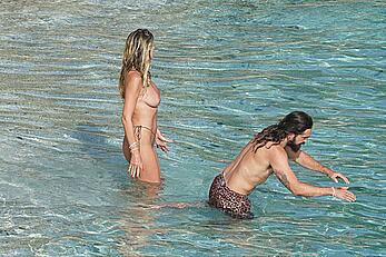 Heidi Klum topless at beach Getaway in St. Barts