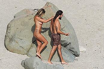 Heidi Klum topless at beach Getaway in St. Barts