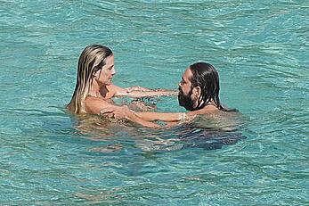 Heidi Klum topless at beach Getaway in St. Barts