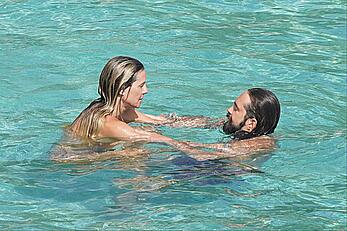 Heidi Klum topless at beach Getaway in St. Barts