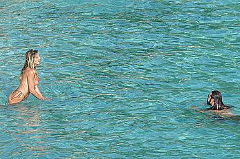 Heidi Klum topless at beach Getaway in St. Barts