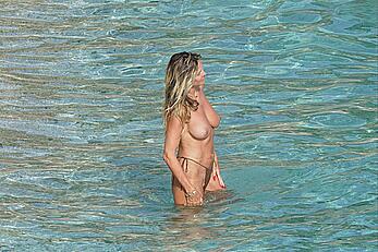 Heidi Klum topless at beach Getaway in St. Barts