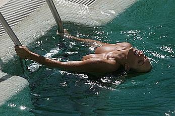 Aisleyne Horgan-Wallace topless in a pool