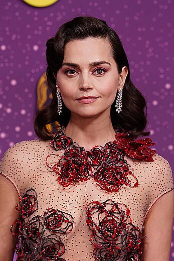 Jenna Coleman braless in sheer dress at 2026 EE BAFTA Film Awards in London