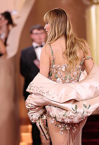 Jennifer Lawrence in see through dress at 83rd Golden Globes Awards in LA