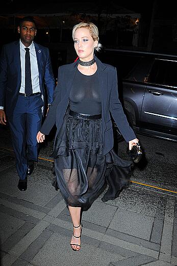 Jennifer Lawrence braless in sheer top while out in New York City