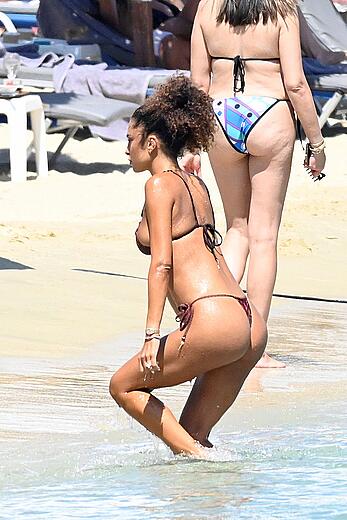 Jessica Aidi in thong bikini on the beach in Mykonos with Marco Verratti - August 01, 2026