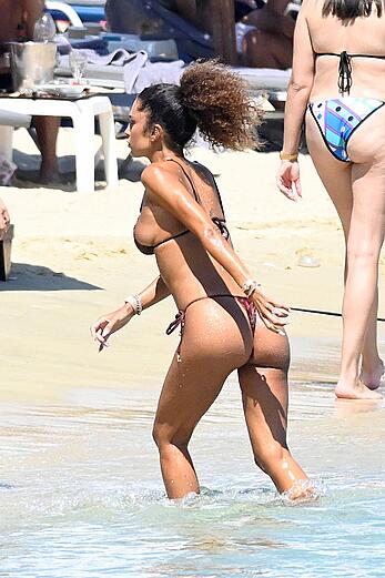 Jessica Aidi in thong bikini on the beach in Mykonos with Marco Verratti - August 01, 2026