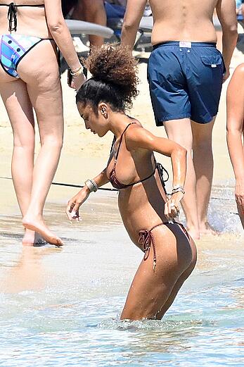 Jessica Aidi in thong bikini on the beach in Mykonos with Marco Verratti - August 01, 2026