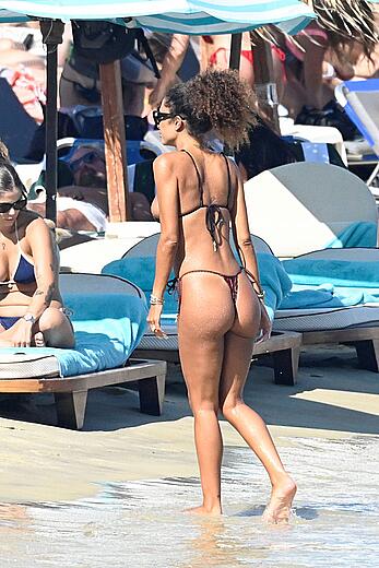 Jessica Aidi in thong bikini on the beach in Mykonos with Marco Verratti - August 01, 2026