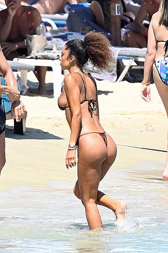 Jessica Aidi in thong bikini on the beach in Mykonos with Marco Verratti - August 01, 2026