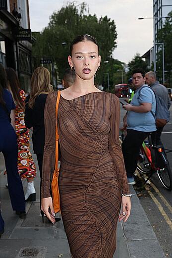 Jessica Alexander wearing a see-through dress at The Ivy Asia Chelsea Launch in London