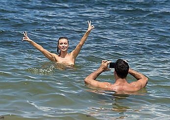 Joanna Krupa topless and in black bikini at the beach in Miami