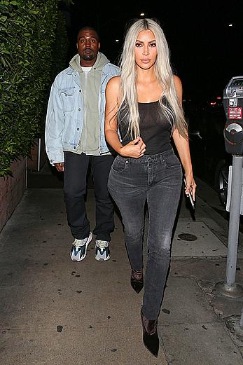 Kim Kardashian in see through black top without bra