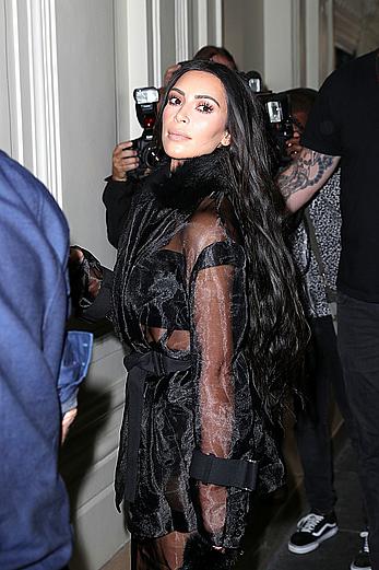 Kim Kardashian has her ass kissed by journalist Vitalii Sediuk in Paris