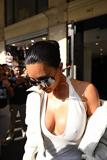 Kim Kardashian pokies at Celine Dion’s concert in Paris - September 16, 2026
