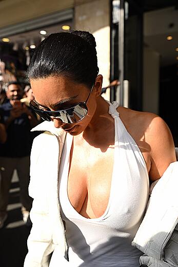 Kim Kardashian pokies at Celine Dion’s concert in Paris - September 16, 2026