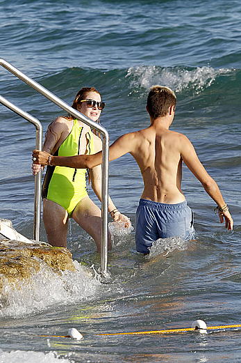 Lindsay Lohan side of boob on the beach In Ibiza