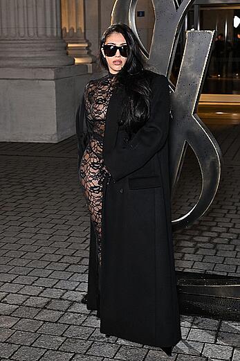 Lourdes Leon sheer nipple show in a black catsuit - Saint Laurent Men Collection FallWinter 2024-2025 Show Paris Fashion Week