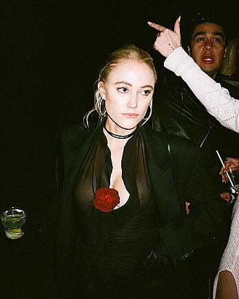 Maika Monroe braless in see throough dress at Born x Raised Sadie Hawkins Winter Formal Event in LA