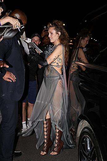 Miley Cyrus in a sheer dress in Paris