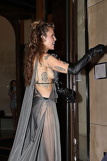 Miley Cyrus in a sheer dress in Paris