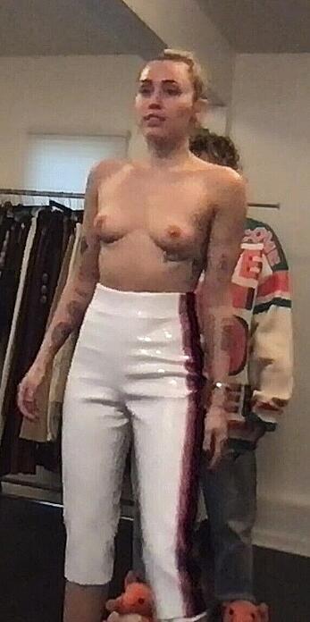 Miley Cyrus topless in Superbowl Dressing Room