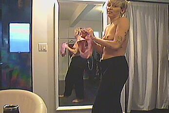 Miley Cyrus topless in Superbowl Dressing Room