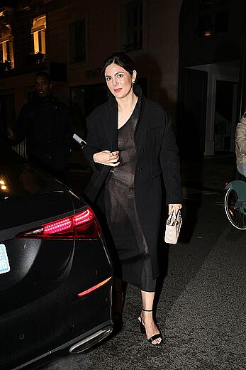 Monica Barbaro braless in see through outfit after enjoying dinner in Paris