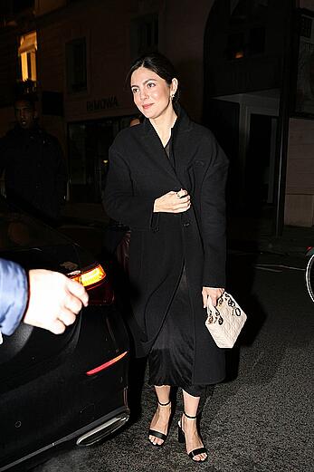 Monica Barbaro braless in see through outfit after enjoying dinner in Paris