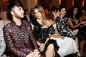 Morena Baccarin cleavage in black dress at Christian Siriano show in New York