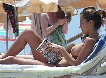 Busty Natalia Sanchez sunbathing topless