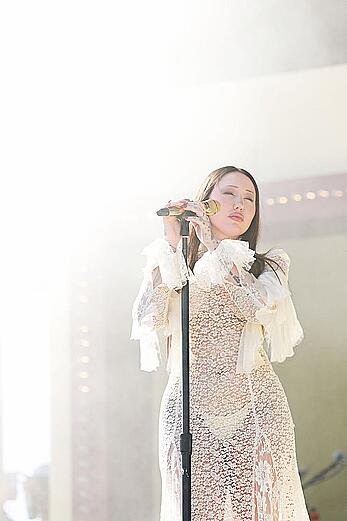 Noah Cyrus braless in see through dress performs at 2025 Coachella Valley Festival