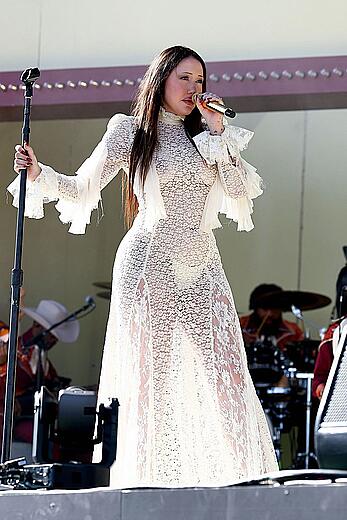 Noah Cyrus braless in see through dress performs at 2025 Coachella Valley Festival