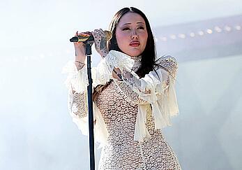 Noah Cyrus braless in see through dress performs at 2025 Coachella Valley Festival