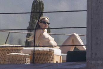 Olivia Wilde soaking up in the sun topless in Mexico - February 11, 2026