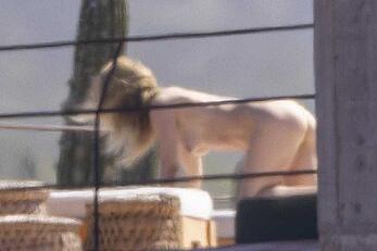 Olivia Wilde soaking up in the sun topless in Mexico - February 11, 2026