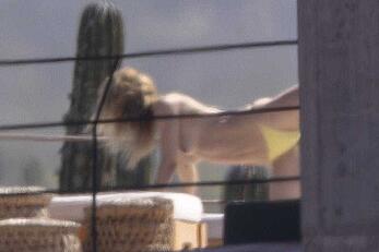 Olivia Wilde soaking up in the sun topless in Mexico - February 11, 2026