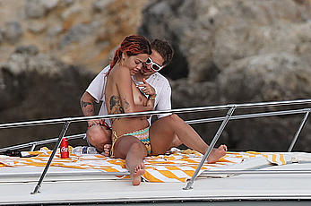 Rita Ora topless on a yacht in Tuscany