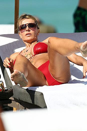 Rita Rusic boob out from red bikini