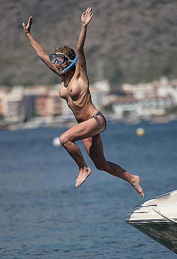 Sarah-Jane Honeywell caught topless on a yacht