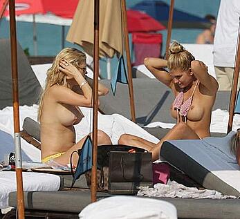 Shayna Terese Taylor and Kristen Nicole topless on a beach