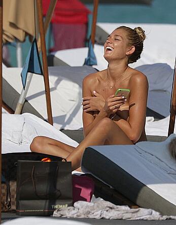 Shayna Terese Taylor and Kristen Nicole topless on a beach
